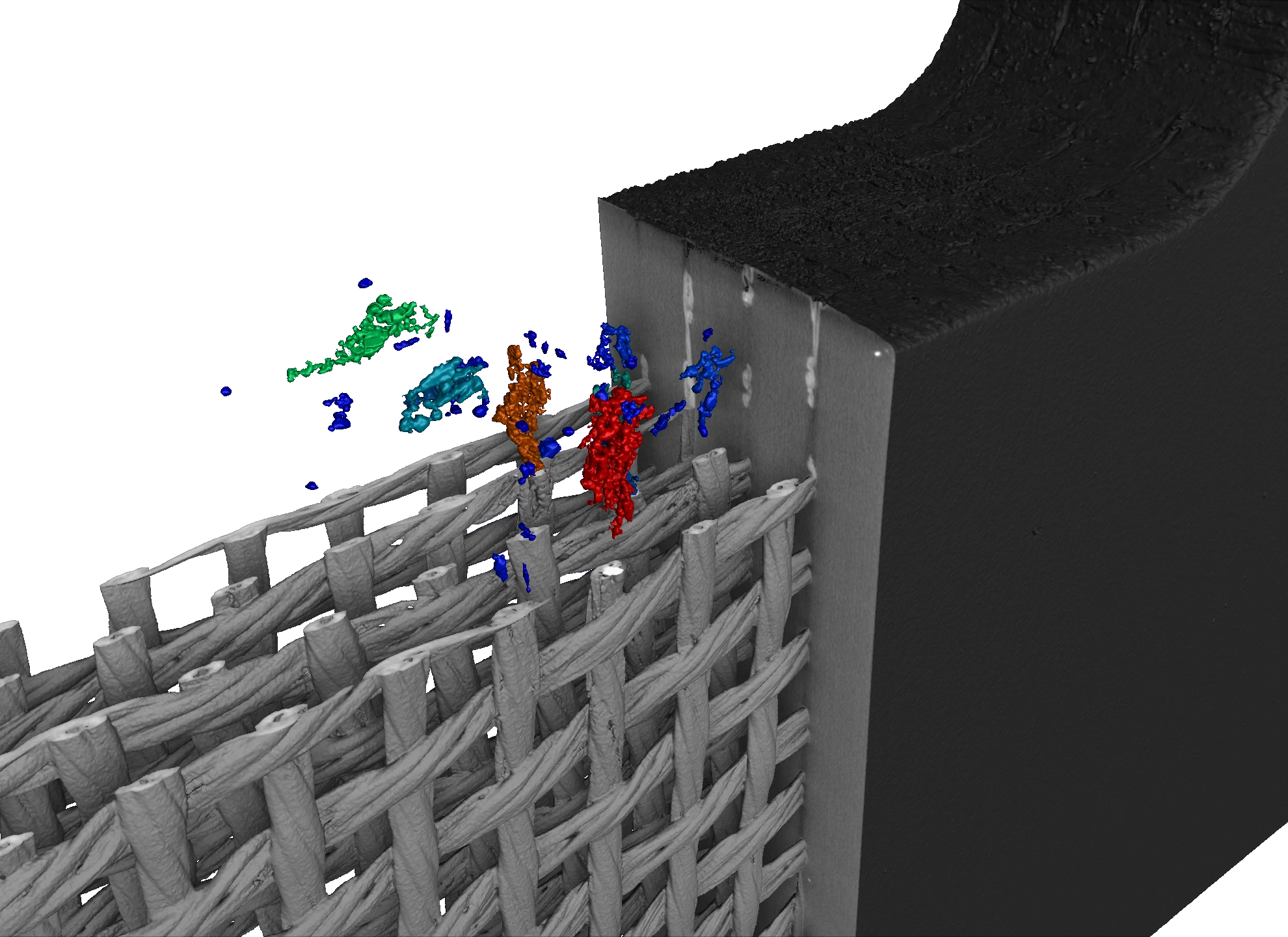 vue 3D représentant une coupe tomographique avec une analyse de porosités dans le tissage