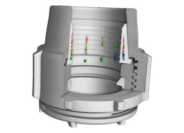 Vue 3D d'un connecteur plastique avec une analyse de porosités et une coupe en 3/4